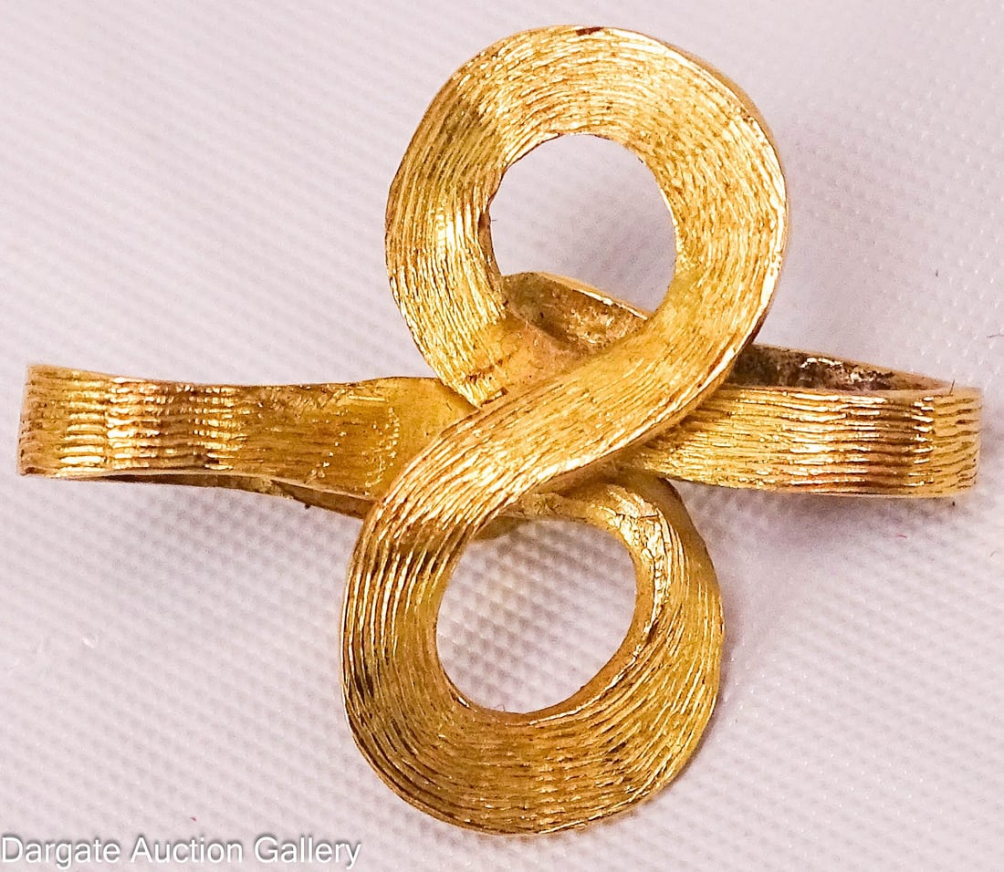 18k YELLOW GOLD INFINITY PENDANT: 18k yellow gold infinity symbol pendant, marked [18k]; Measures: Total Gross Weight - 3.9g