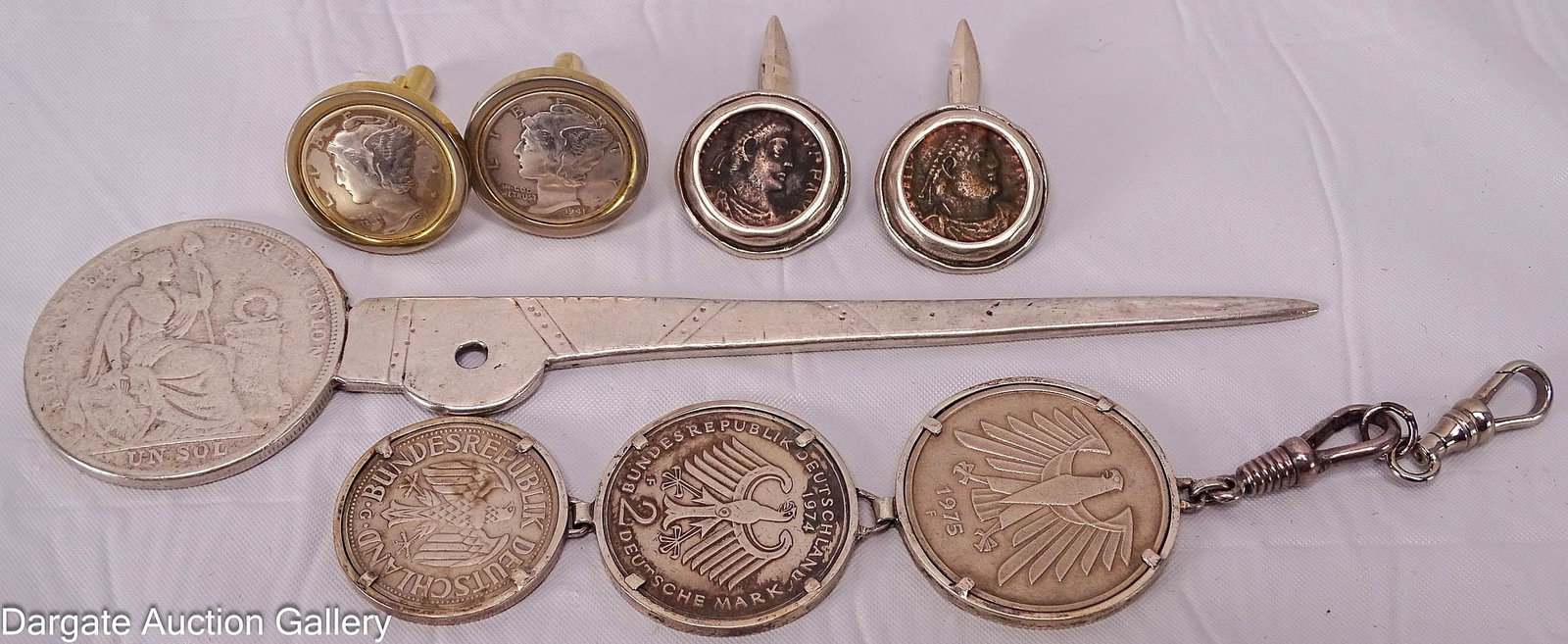 4pc GENTLEMAN'S LOT COIN JEWELRY & ACCESSORIES: Includes: (1) Letter opener made with 1924 Peruvian 1 Sol silver coin (50% silver); (1) key fob with 3 German Deutsche marks: 1975 5 DM, 1969 2DM and 1970 1 DM; (1) Pair cufflinks, made from 1941 US M