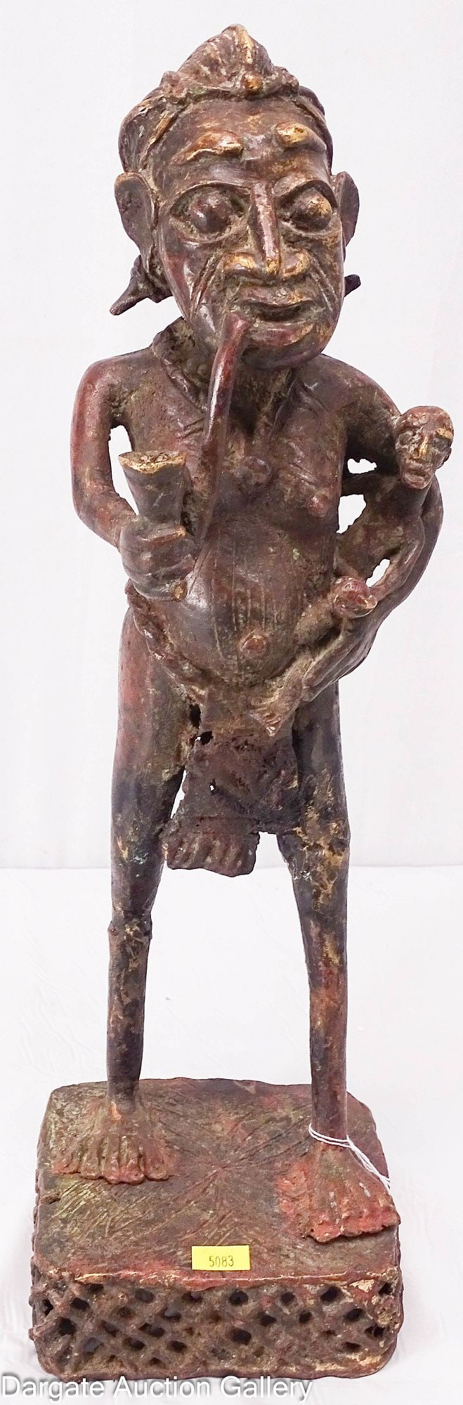 CAMEROON AFRICAN BAMILEKE BRONZE MATERNITY FIGURE: African Bamileke bronze maternity figure of a woman smoking a pipe holding a child. From Cameroon. / Dimensions: Height 17.75" x Width 5.5" x Depth 5". /