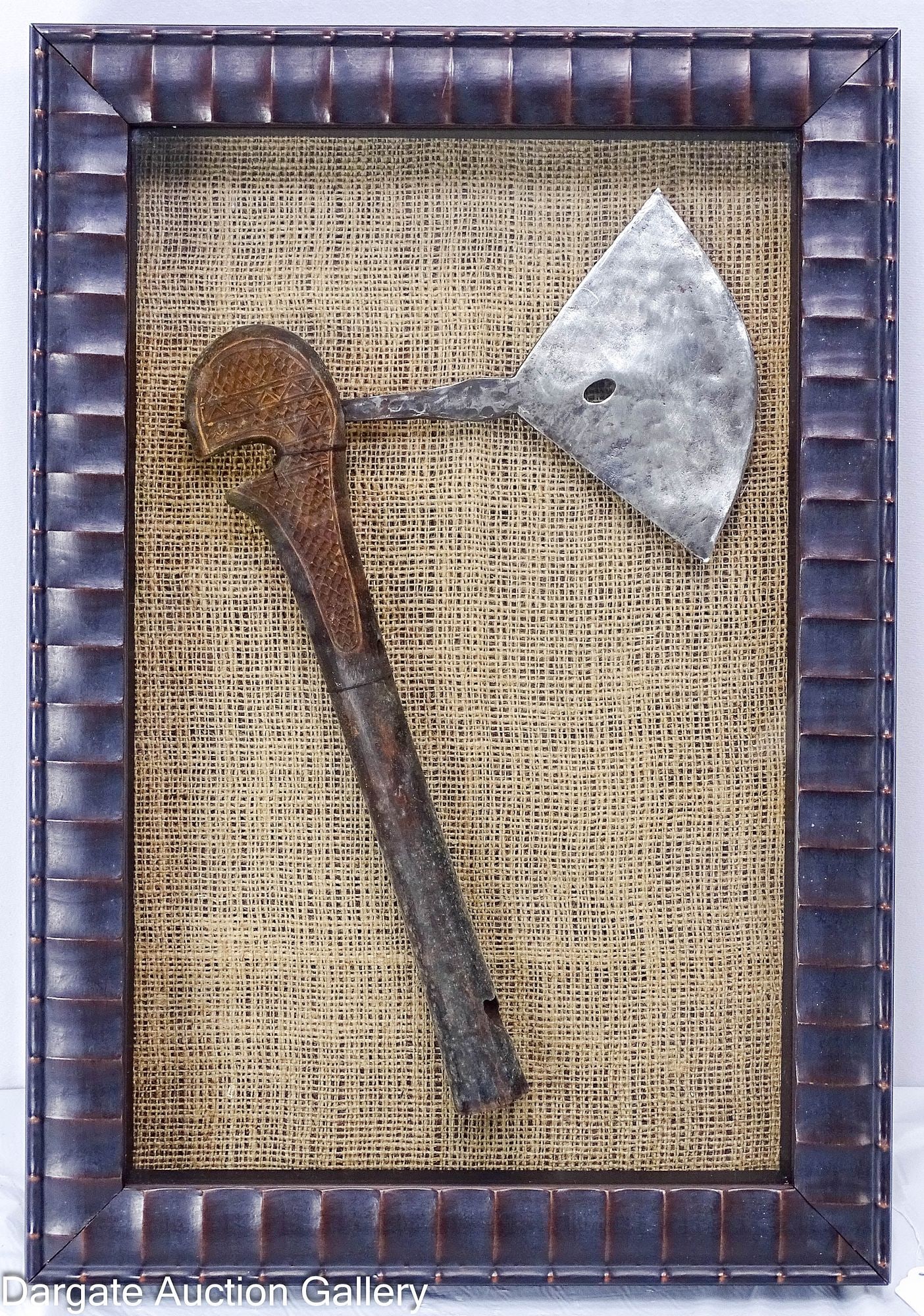 AFRICAN CEREMONIAL AXE SAPO/SONGYE / LUBA: An African ceremonial axe from the Songye, Luba, or Yaka tribes of the Democratic Republic of the Congo. Features a hand-forged iron blade with a decorative center hole, set into a hand-carved wooden 