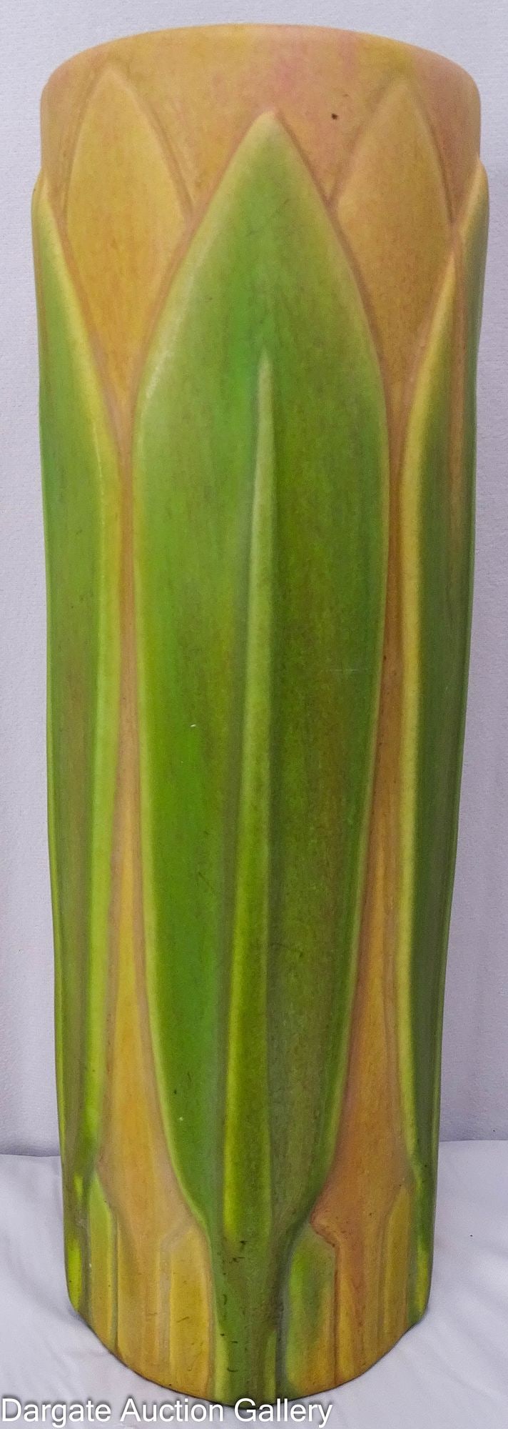 ROSEVILLE EARLY VELMOSS ART POTTERY VASE: American Roseville Pottery Arts & Crafts style early Velmoss pattern, molded leaf design with a green and dark mustard matte finish; unmarked circa 1925; Measures: 12"H x 4" diameter; Co