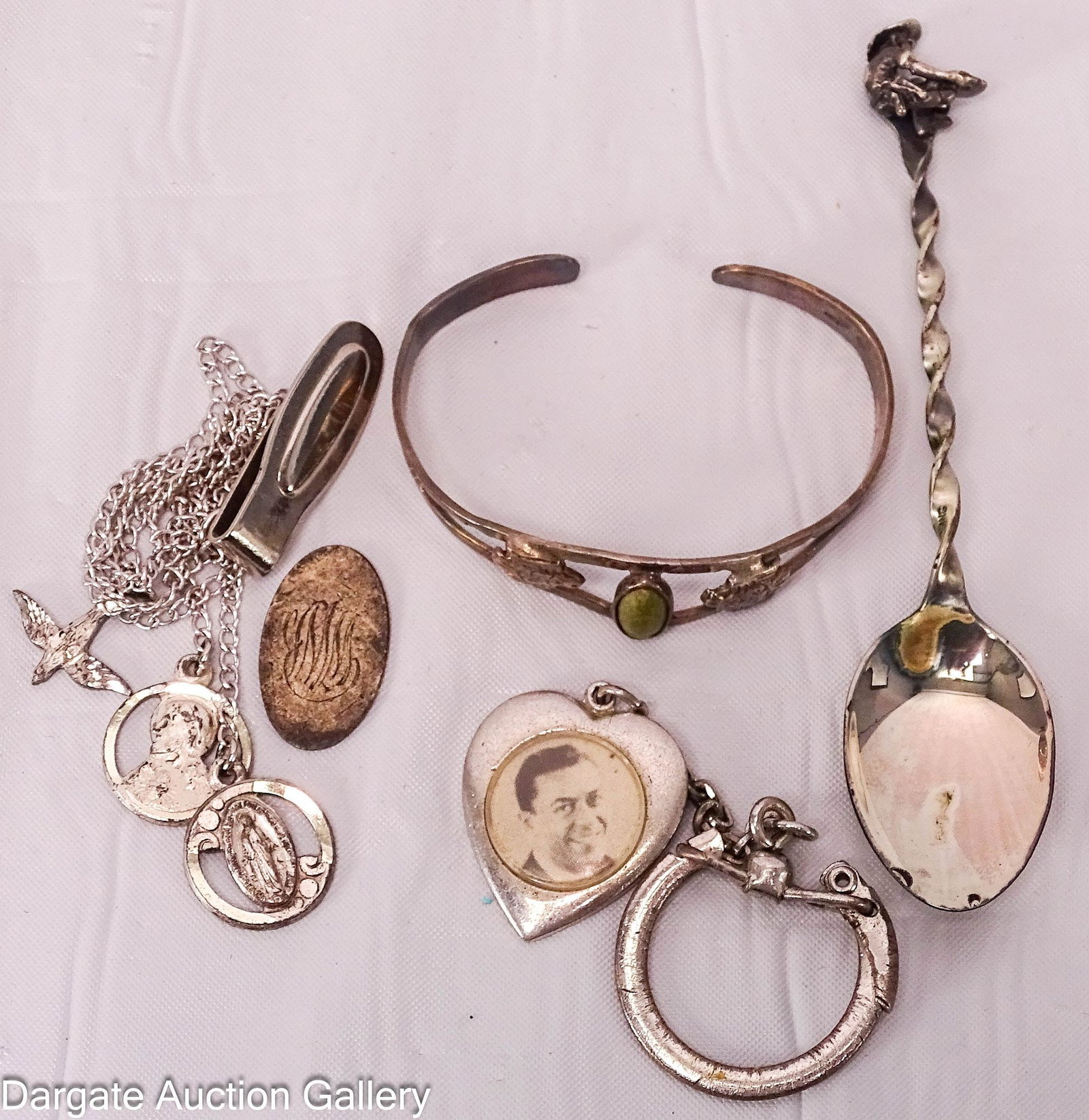 5pcs ASSORTED STERLING JEWELRY: All pieces marked Sterling; Includes: baby bracelet oval monogrammed earring piece heart keychain with photo souvenier spoon bookmark with charms (Charms marked Sterling) Tot