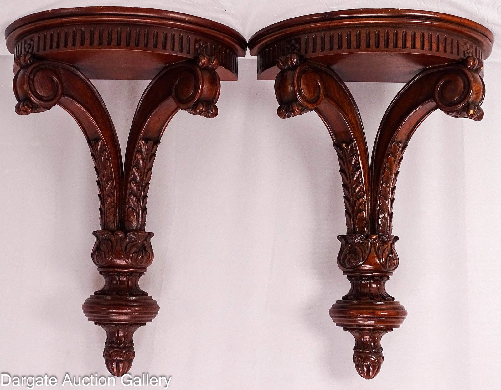 PAIR MAITLAND SMITH GEORGIAN-STYLE SCONCES: Pair of carved mahogany Georgian-style demi-lune wall sconces featuring acanthus leaves and original tags / Dimensions: 19" H x 14" W x 7" D /