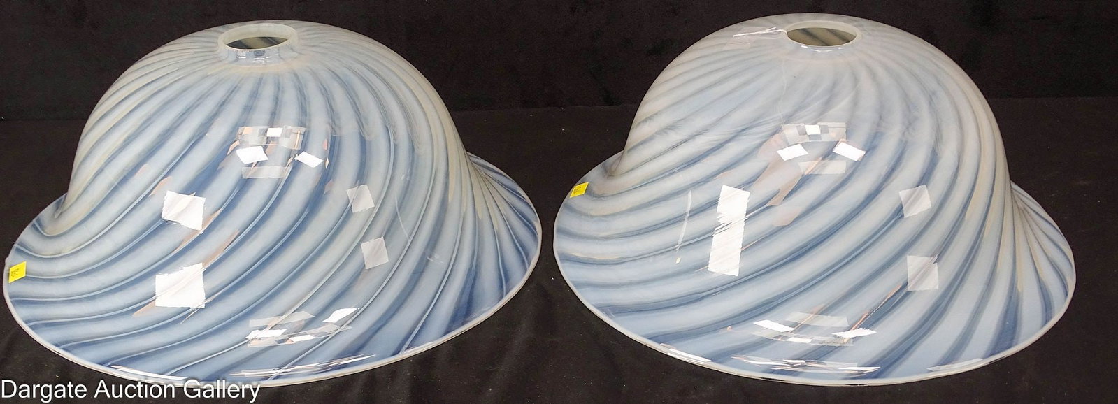 PAIR LARGE OPALESCENT LIGHT SHADES: Pair large dome shaped art glass opalescent swirl light shades; ranges in color from white to a light grey-blue color ground on top and bottom; Measures - 2" fitter, 6"H x 14.5"