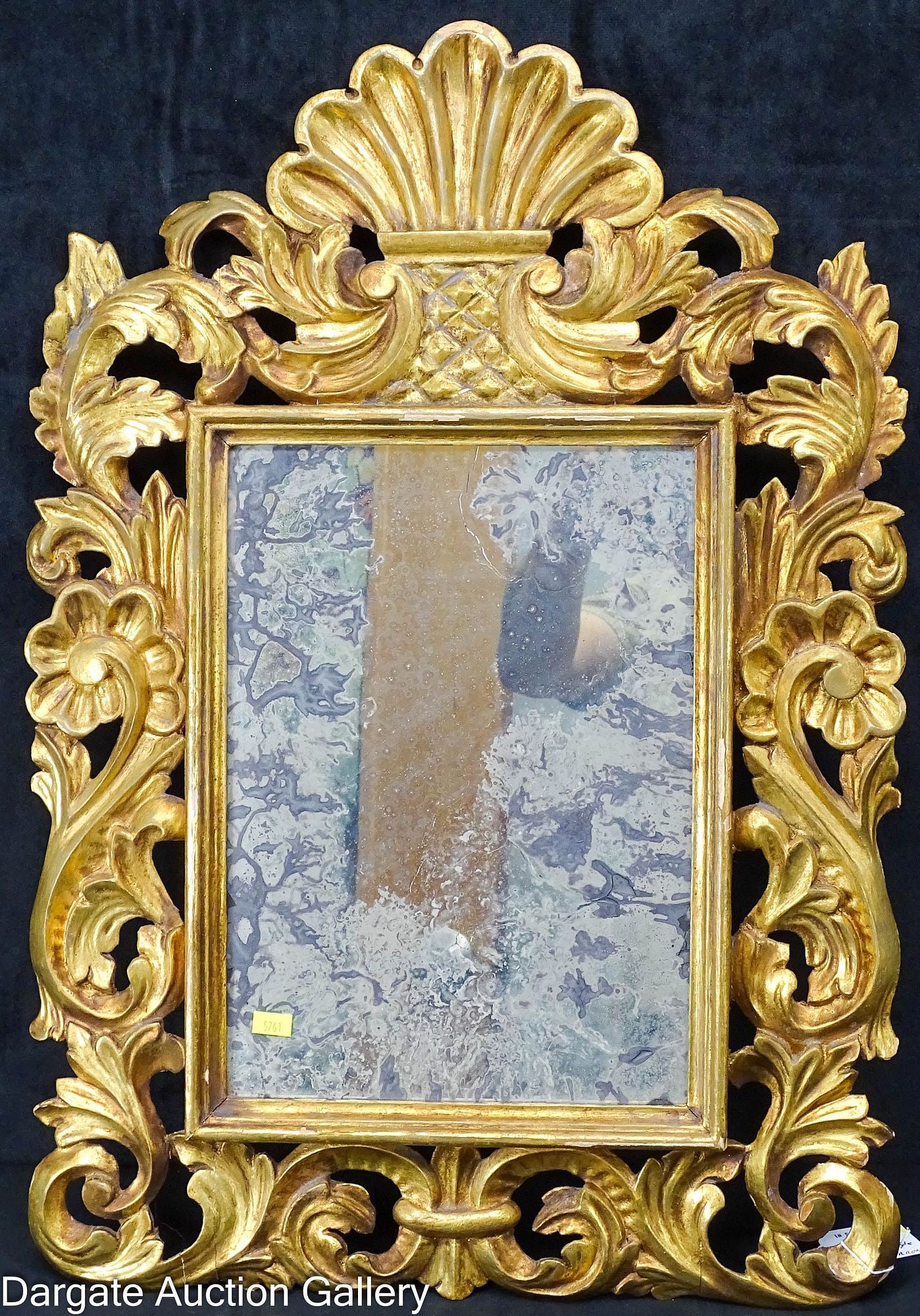 CONTINENTAL CARVED AND GILT VENETIAN STYLE FRAMED MIRROR: Measures: 26"H x 18"W x 1.5"D; Condition: Cracking, gilt loss, significant silver loss