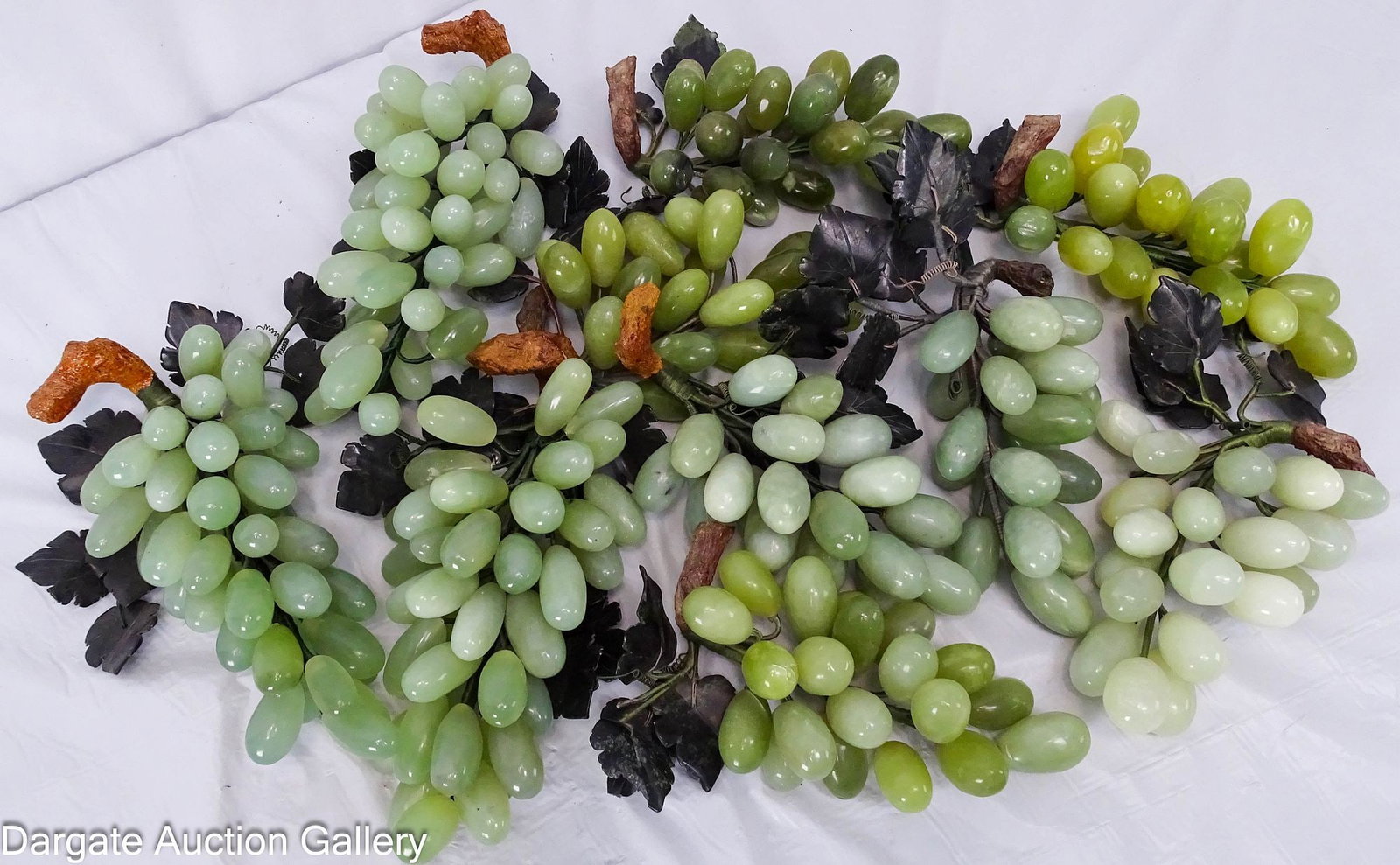 (10) JADE AND HARD STONE GRAPE CLUSTERS: Bunches/Cluster of grapes carved from jade and hard stone, wired together, with leaves; Measures: Grapes - 1"-1.5" long, Clusters - 8" - 10" long, 4.5" - 8" wide, 2.5&quo