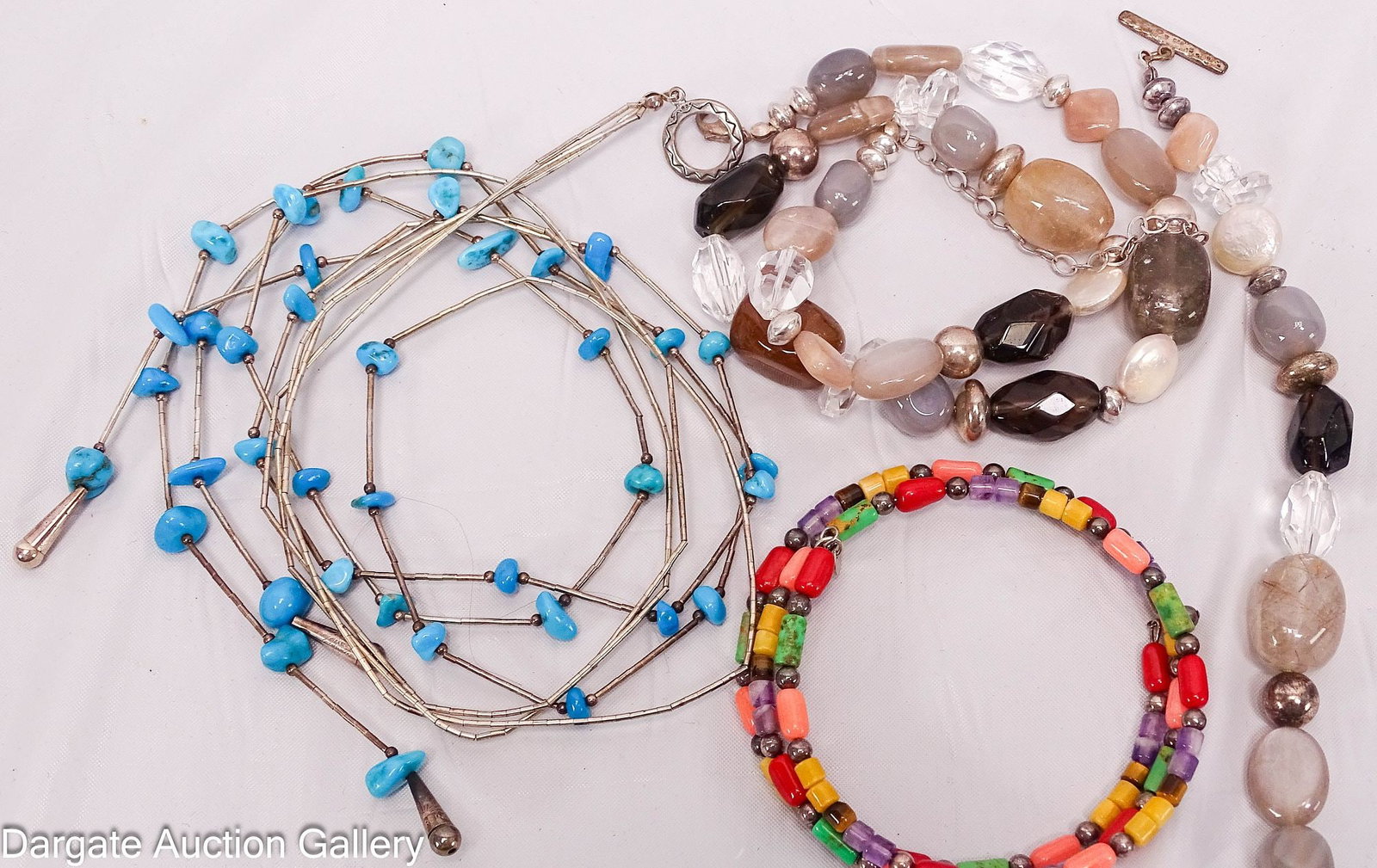 4pcs SHUBE STERLING AND HARDSTONE JEWELRY: All marked [925] with [s/b] mark; Includes: Multi-stone wrap bracelet (memory wire wrap) - turquoise, red coral, spiny oyster, amethyst and tigers eye Sterling and turquoise liquid silver type n