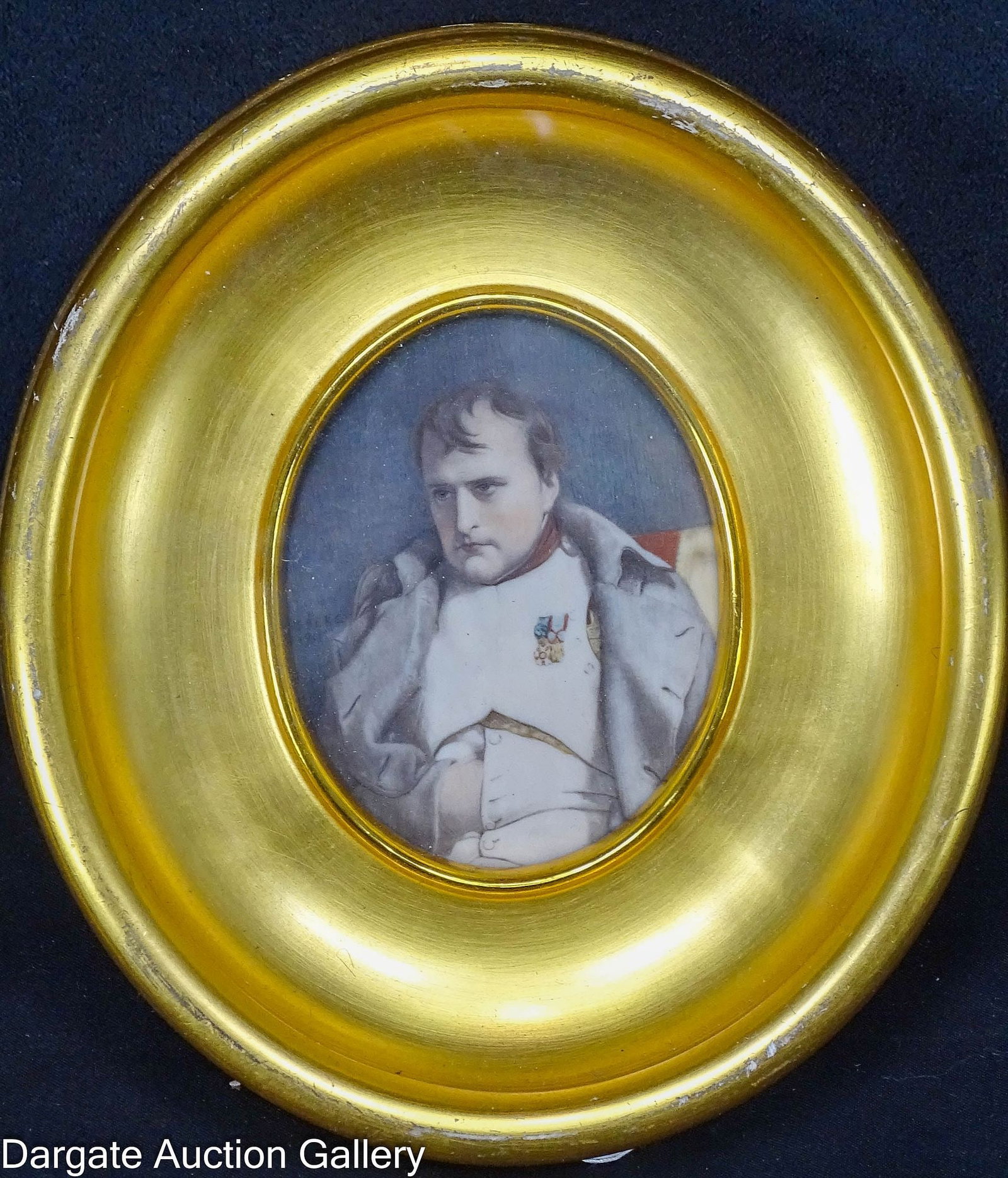 FRAMED MINIATURE PAINTING NAPOLEON ON BONE: A oval miniature oil painting on bone of Napoleon in a gilt wood frame, behind glass; Signed left center - frame partially covers the name, ends in [SBERG] and is dated [1911]; Measures: Visible Art -