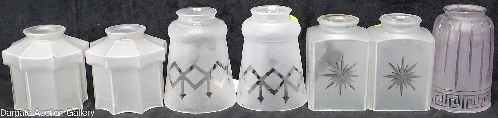 (7) ASSORTED FROSTED GLASS LIGHT SHADES 2.25" FITTER: Includes: A pair of square Mission or Arts & Crafts style glass shades with cut sunburst detail (4.5"H x 3.25" square) A pair of pagoda style shades (4.25"H x 4.25" diame