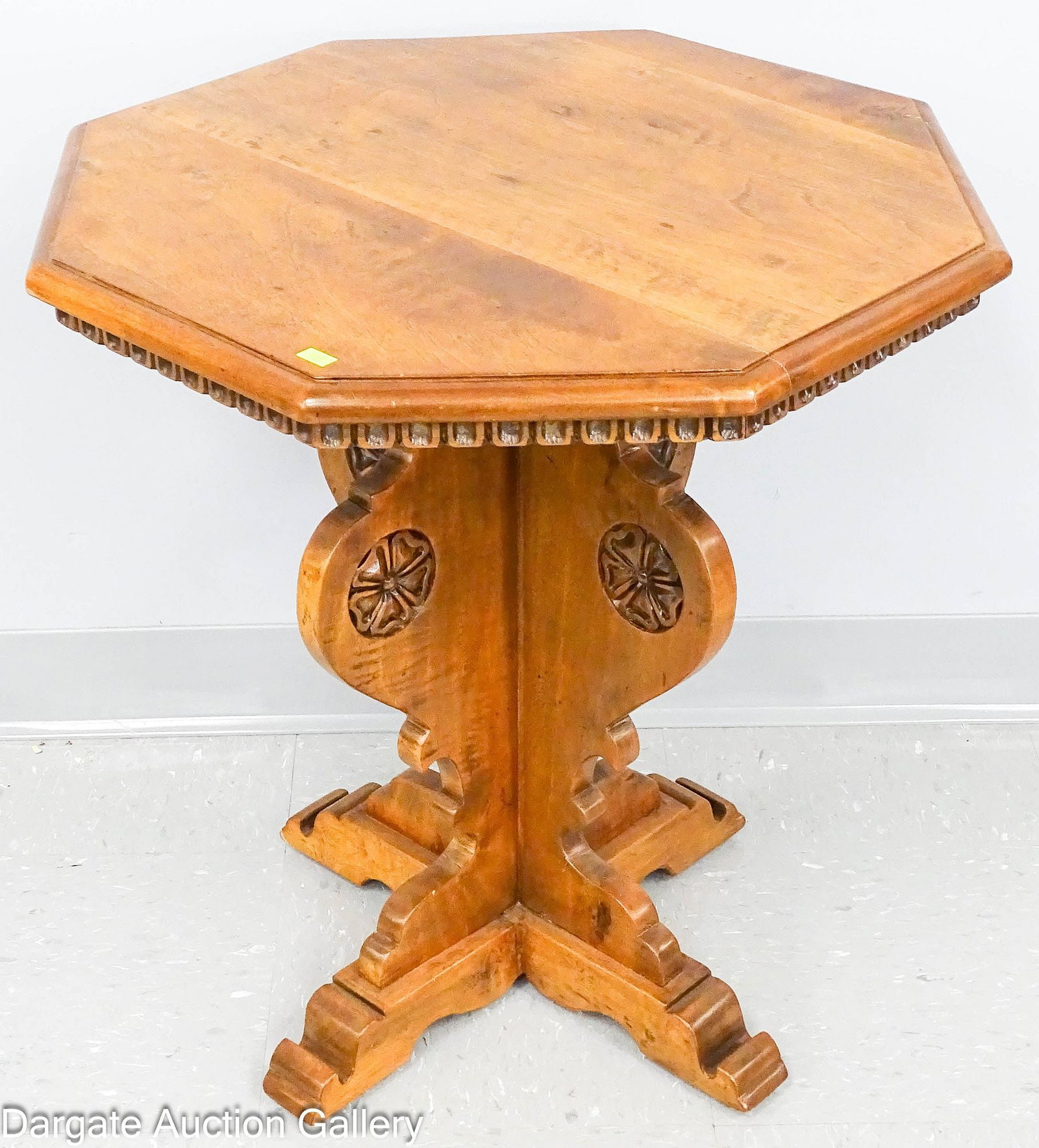 CONTEMPORARY VICTORIAN WALNUT SIDE TABLE: Octagon top walnut Victorian style side table with carved floral rosettes, medallions, carved scalloped style skirt and "X" shaped base; Measures: 24"H x 24" diameter