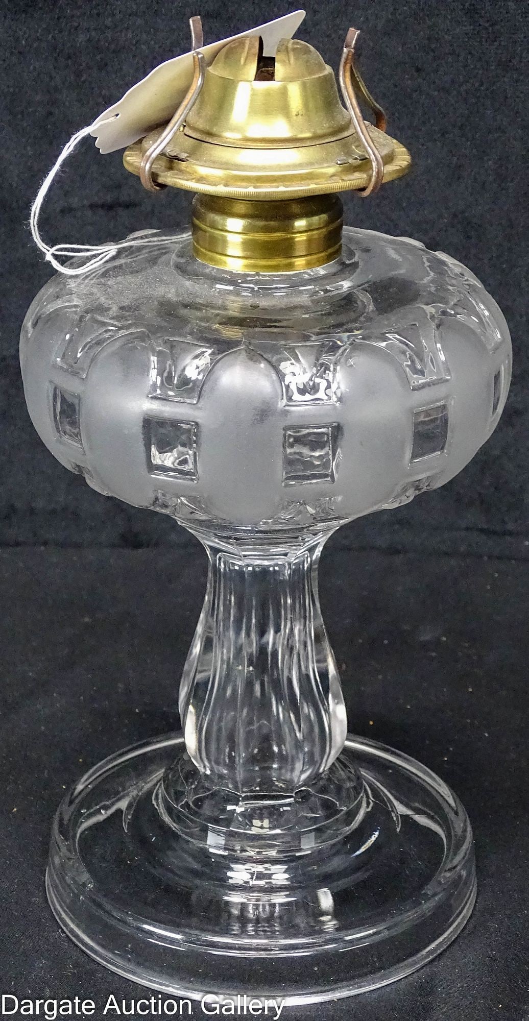 FROSTED OVAL PICKETS ANTIQUE STAND LAMP: Clear glass stand oil lamp in unknown pattern; font has narrow oval frosted connected picket panels alternating with clear glass with frosted triangles top and bottom; hexagon column with a plain roun