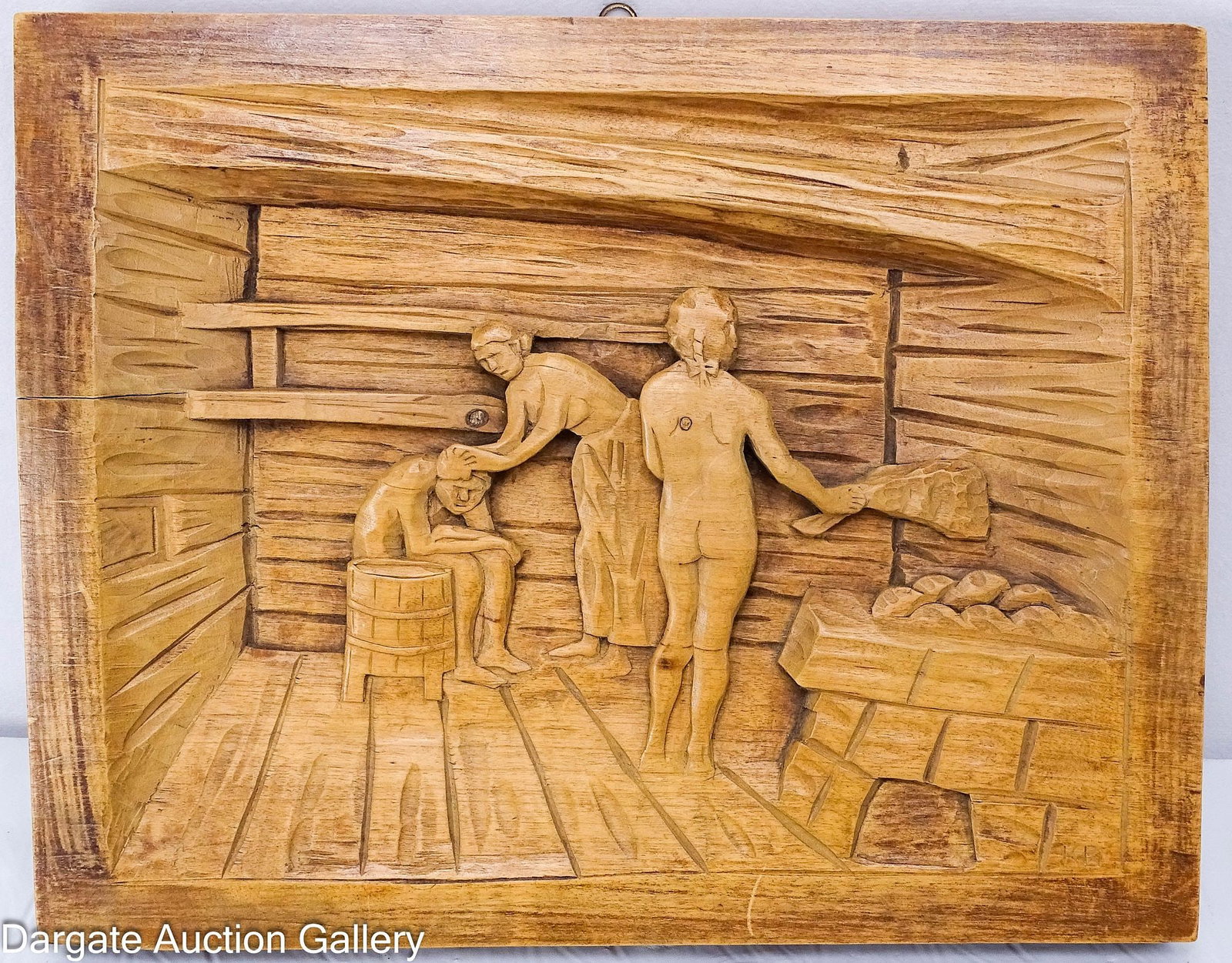 SCANDINAVIAN HAND-CARVED WOODEN PANEL: Hardwood wooden panel depicting a scene of traditional sauna activities popular in Norway, Finland, and Sweden. Signed in the bottom right corner [K.B.] and includes a brass hook for hanging /