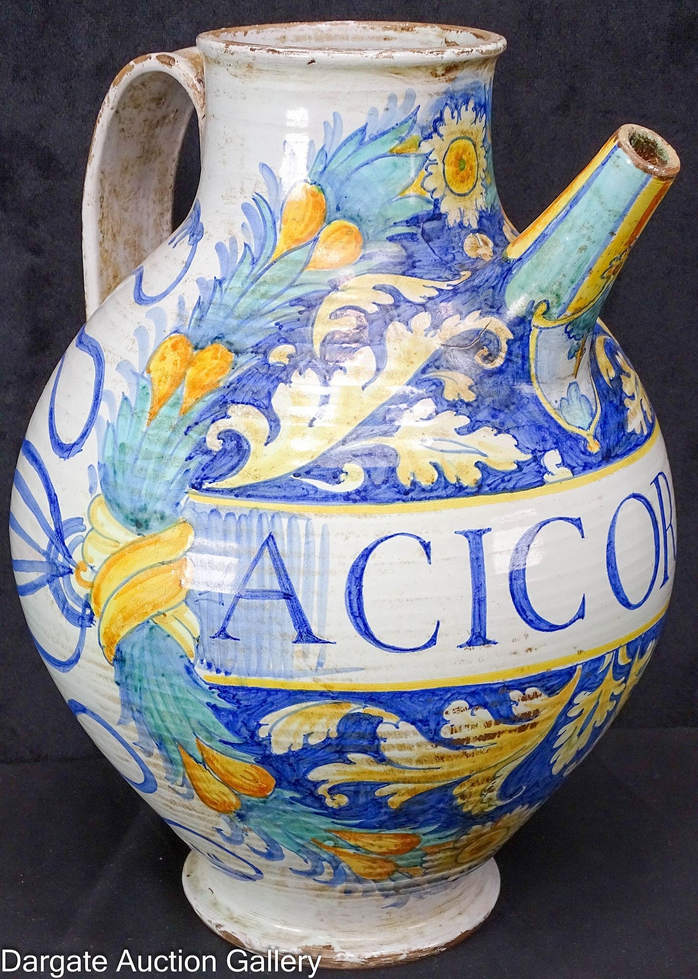 ITALIAN DERUTA POTTERY ACICORE APOTHECARY PITCHER: An Italian Deruta pottery apothecary pitcher [ACIC OREA] writen on front with a foliate and scroll design; marked in black on bottom [ITALY]; Measures: 13.5"H x 10.75"W x 10"D; Conditio