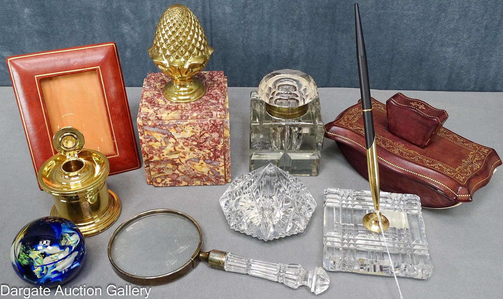(9) DECORATIVE EXECUTIVE DESK TOP ITEMS: Includes: Waterford (signed) pen holder 3.25"H x 3.5" diameter Paperweight 2.5"H x 3.5" diameter Magnifying glass 7.25"L Art glass paperweight 2.25" diameter El Cas