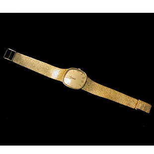 MAN'S 14K "MOVADO" WATCH. The watch has: MAN'S 14K "MOVADO" WATCH. The watch has a gold mesh band. Total watch weight is approximately 33.6 dwt. Condition: appears to be in working order; minor scratches on the back of the case.