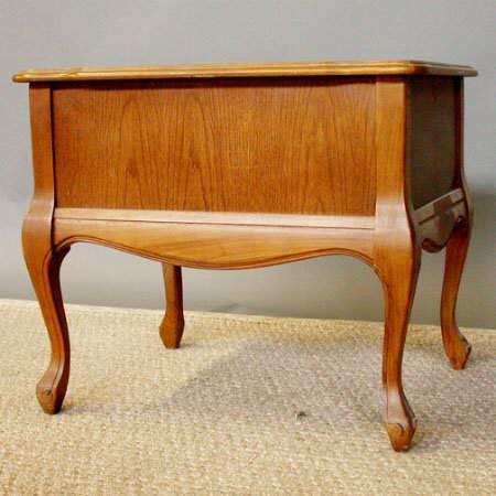 FOSSIL STONE TOPPED END TABLE. On a walnut frame: FOSSIL STONE TOPPED END TABLE. On a walnut frame having one deep drawer and raised on cabriole legs. Size: 22'' H, 21'' W, 26'' D. Condition: minor scratches.