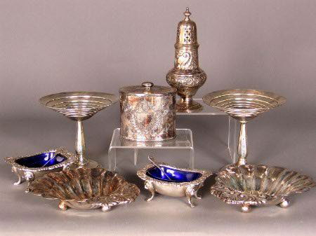 SILVER SERVEWARE. The lot includes the following: SILVER SERVEWARE. The lot includes the following: two matching International sterling compotes; Measure: 5 1/8'' h., 5 3/4'' d. Condition: both are dented; tarnish marks. one hallmarked ''Made in Engl