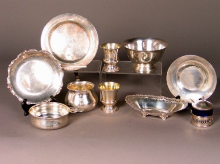 STERLING SERVEWARE. Lot includes the following te: STERLING SERVEWARE. Lot includes the following ten pieces: a bowl marked: ''Steiff Sterling''; Condition: scratches. a baby dish with ''bunny'' scenes marked: ''Sterling''; Condition:dents and scratch