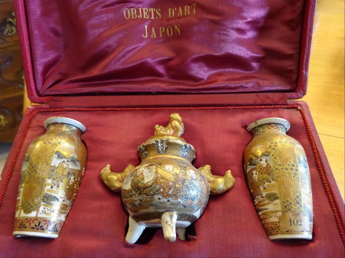 A FINE SATSUMA ALTAR MINIATURE GARNITURE: A FINE SATSUMA ALTAR MINIATURE GARNITURE WITHIN AN OLD BOX Japan, Meiji period, Early 20th century