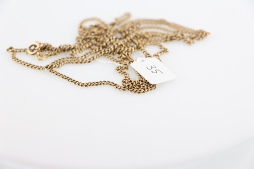 Bijoux: SAUTOIR Ã maillons ronds ciselÃ©s en mÃ©tal jaune 18K (750Â°/00) Ã dÃ©cor filigranÃ© Longueur : 122 cm Poids : 40.8 g.