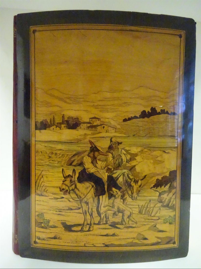 Rgionalisme: MARQUETERIE NICOISE - Album de photographies en bois d'olivier dcor de paysans chevauchants des nes dans un paysage, chiffr au dos LM. Circa 1900. 31,5 x 24,5 cm