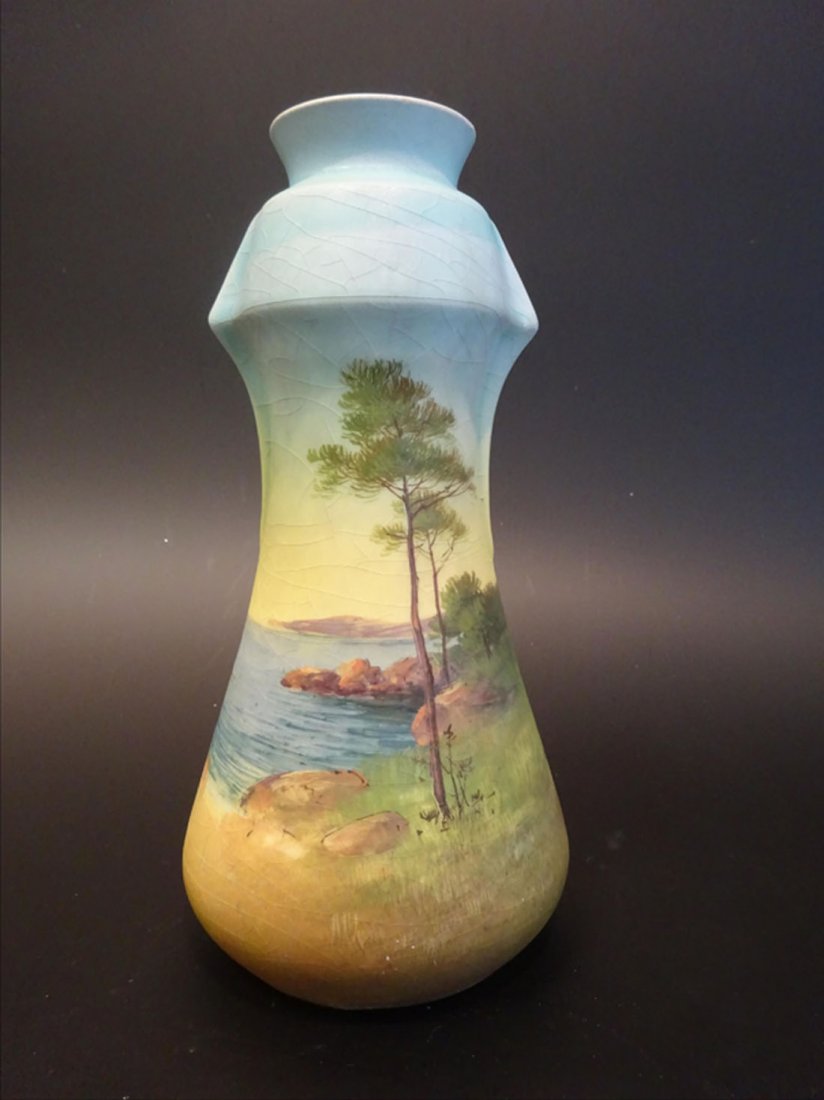 Objets d'Art: Jrme MASSIER (1850-1926) Vase conique panse cintre et col bulbeux en barbotine orne d'un paysage mditerranen. Sign au bas de la panse. Sign, monogramm et situ au dessous. H: 23 cm