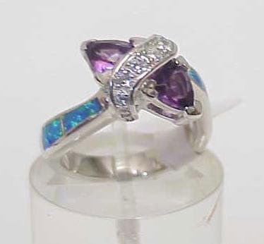 STERLLING SILVER SIM OPALS & SIM AMETHYST RING 7: Awesome new highly polished solid sterling silver high quality ring with inlayed sim opals with 2 sim amethyst cz trillion cut stoned in a trendy setting size 7.