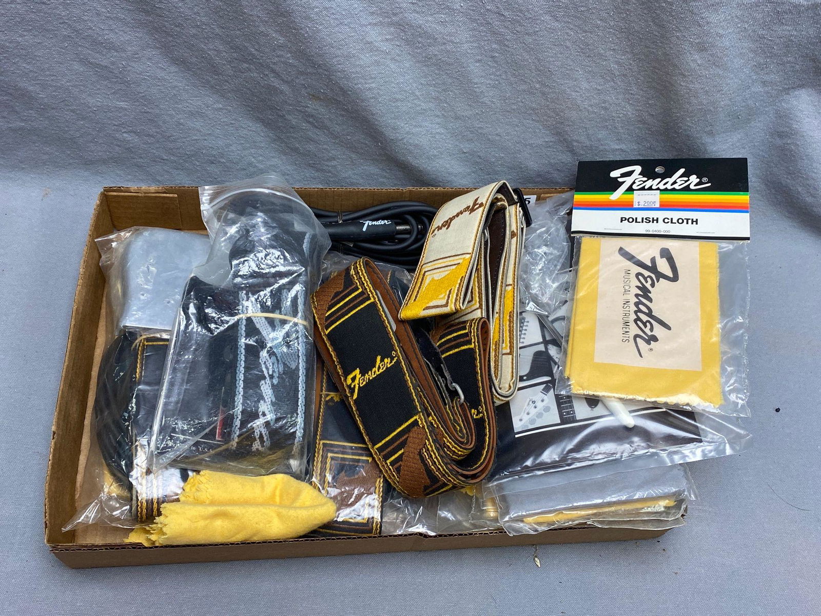 Lot Fender straps, cable polishing cloths etc (1 of 4)