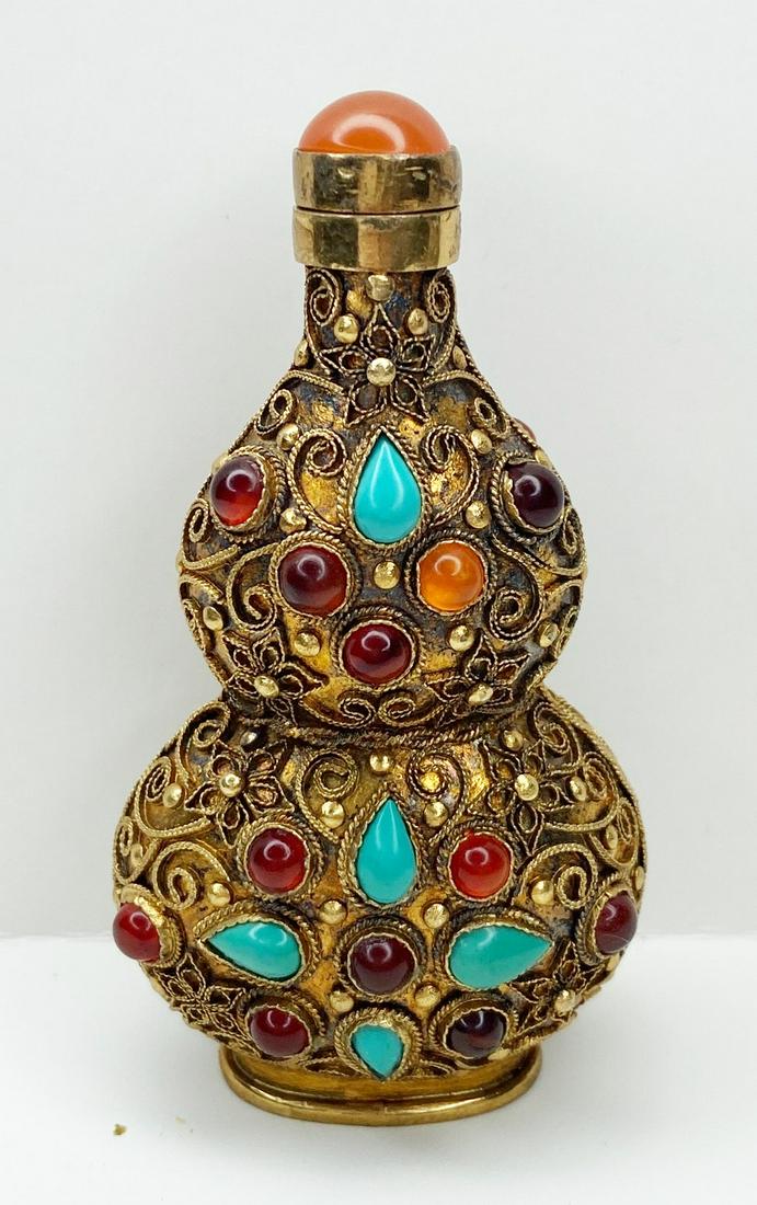 Chinese Jeweled Filigree Snuff Bottle: 3" tall, 1 3/4" at widest.