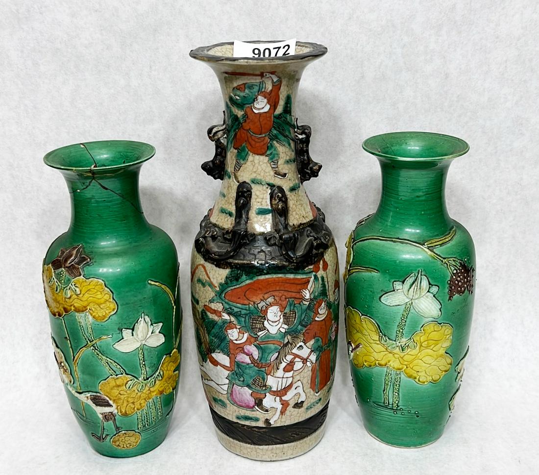 3 Chinese porcelain vases: Tallest stands 11 1/2" in height. One green vase has chipped rim and hairline. Other vase with cracks & repairs.