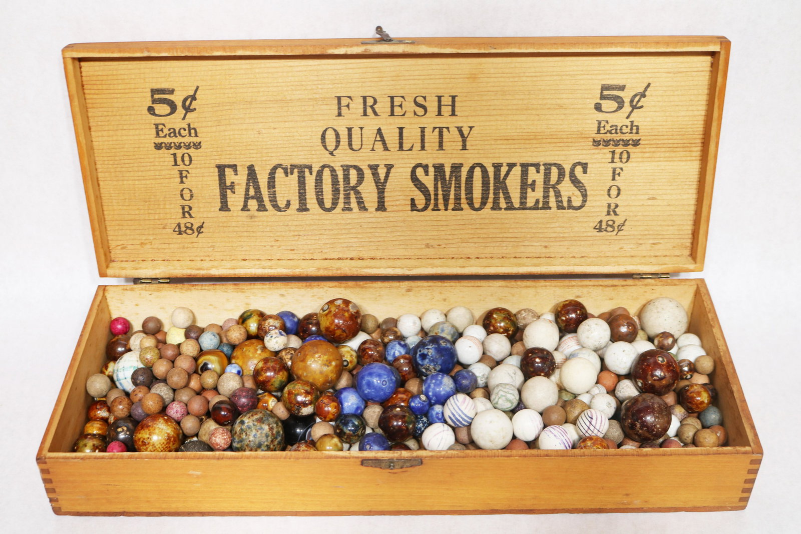 Generous lot of bennington, china, and painted china marbles (1 of 7)