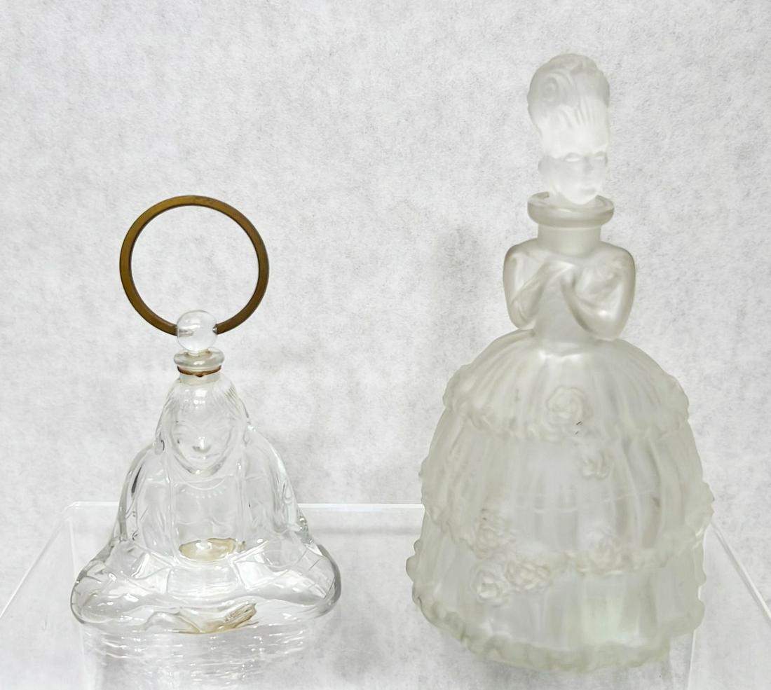 Baccarat And Bohemian Glass Perfume Bottles: The larger bearing spurious R. Lalique mark and measuring 6" tall. Both in good condition.