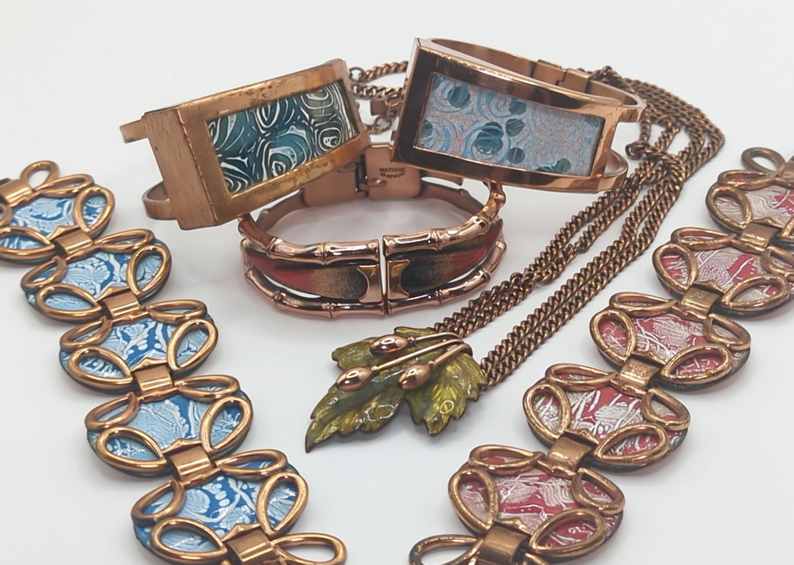 MATISSE RENOIR; Assorted Modernist Enamel On Copper Jewelry: All marked. Three hinged cuffs 2" to 2 3/8" wide, two link bracelets to fit 6 1/2" wrists, necklace with 24" length. Good condition wih some oxidation and minor imperfections.