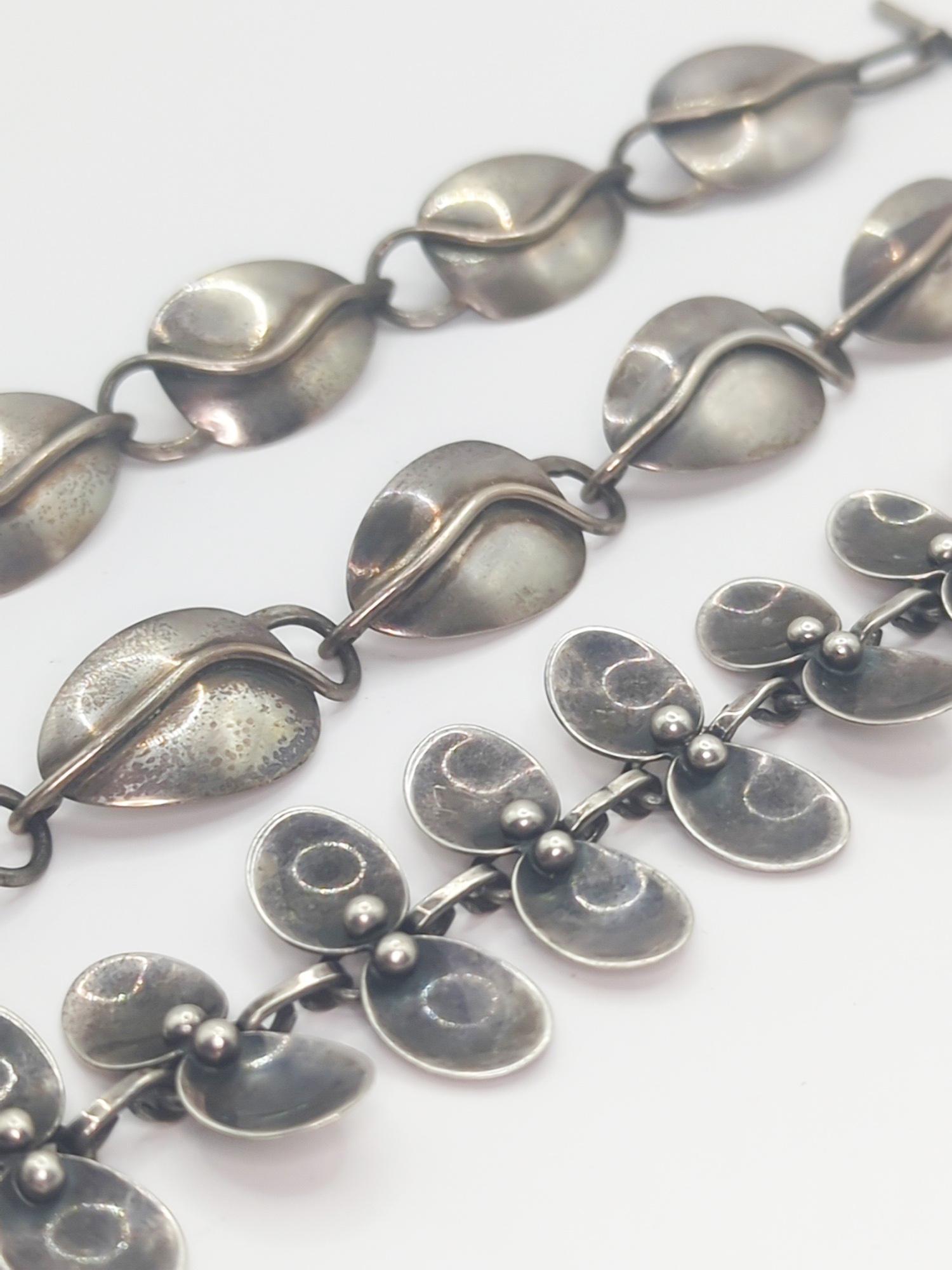 CARL OVE FRYDENSBERG; Modernist Sterling Silver Jewelry: Danish, 20th century. Necklace measuring 14" and bracelet measuring 7", each with toggle closures and in good condition, 51 grams.