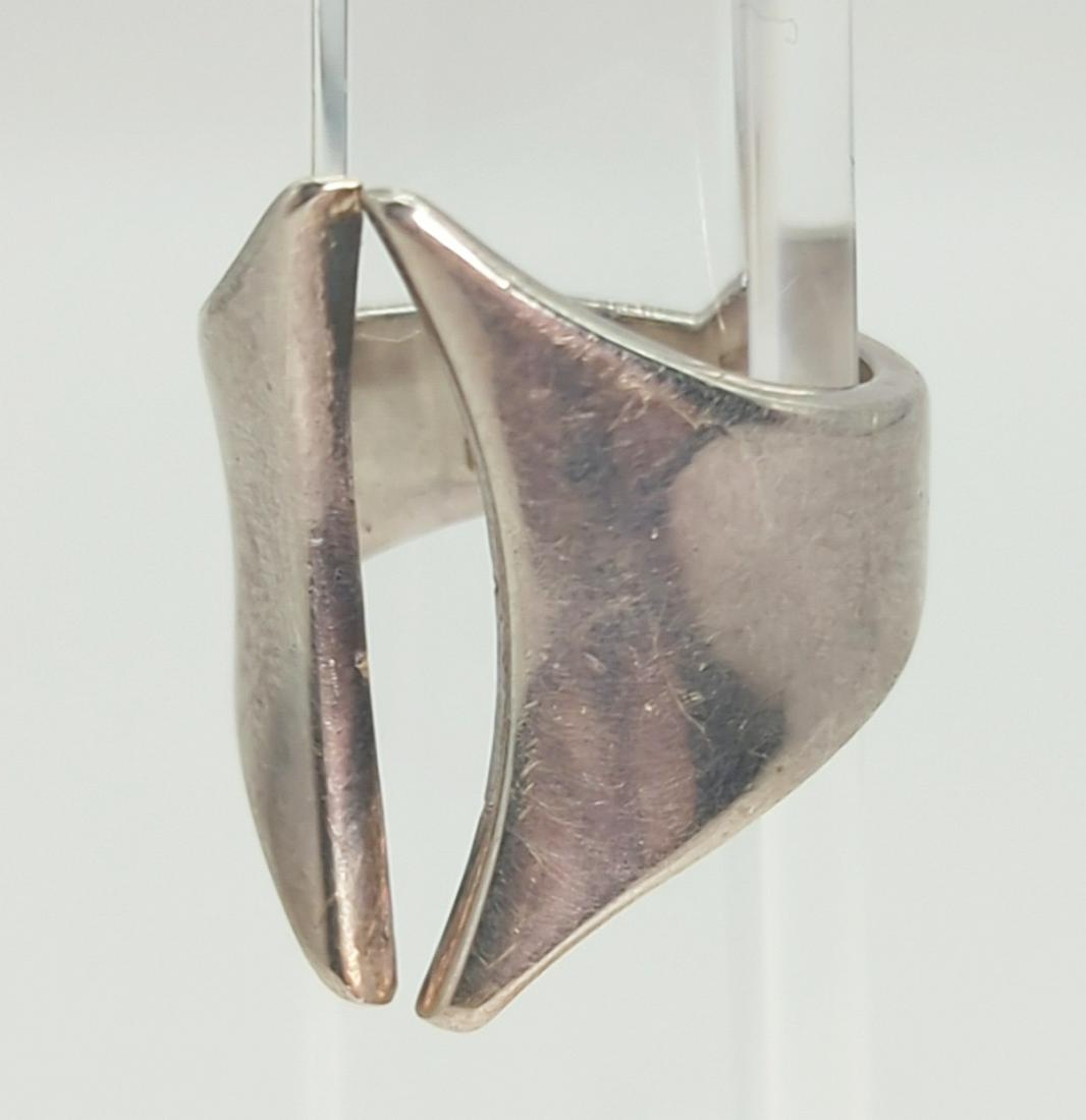 ANDREAS MIKKELSEN, DANISH; Modernist Sterling Silver Ring: 20th century. Approximately 1 1/8" tall at front, size 7-7.5, 12 grams. Good condition.