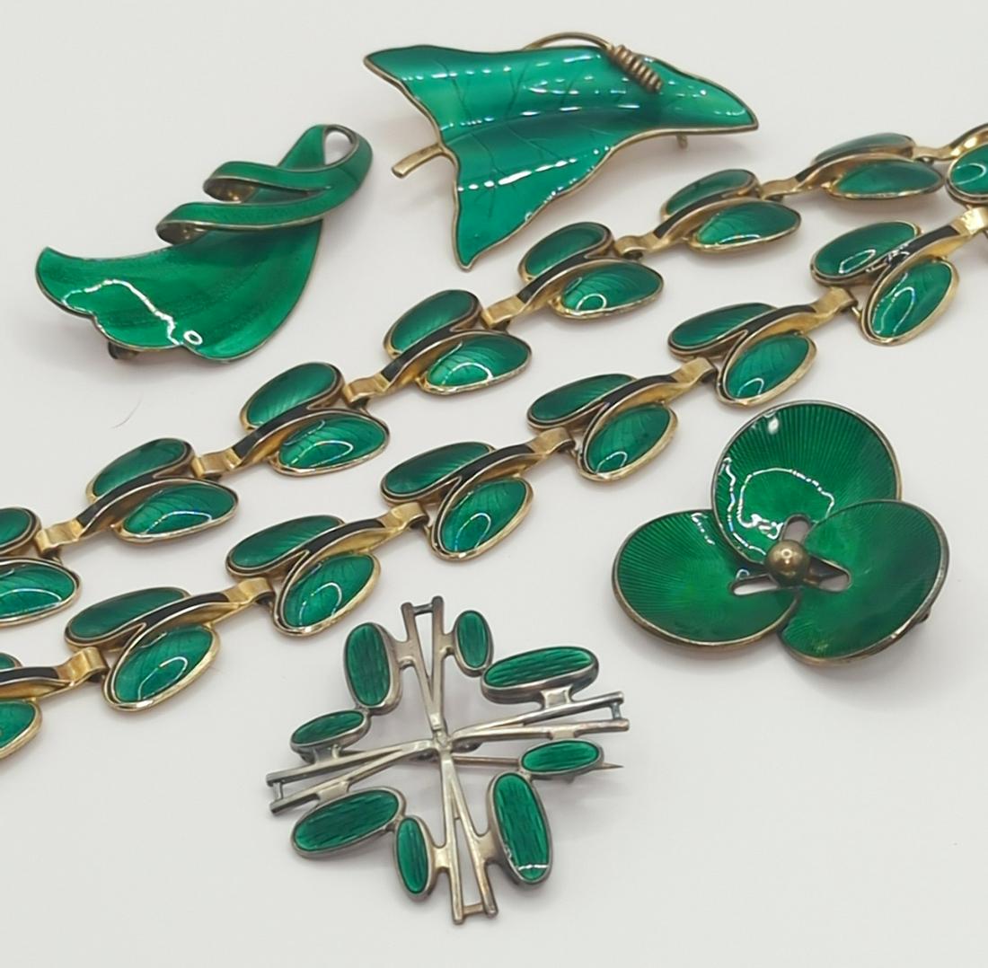 ANDRESEN & SCHEINPFLUG, ETC; Modernist Sterling Enamel Jewelry: Scandinavian, 20th century. A&S necklace measuring 17", Albert Scharning 1 5/8" brooch, three brooches from 1 5/8" to 2 1/4", 80 grams. Good condition with minor imperfections.