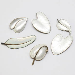 SCANDINAVIAN; Four Modernist White Enamel Silver Leaf Brooches: 20th Century. Makers Include Volmer Bahner, Etc. Sizes From 1 3/4" To 2 3/4". Total Weight 71 Grams. Minor Imperfections