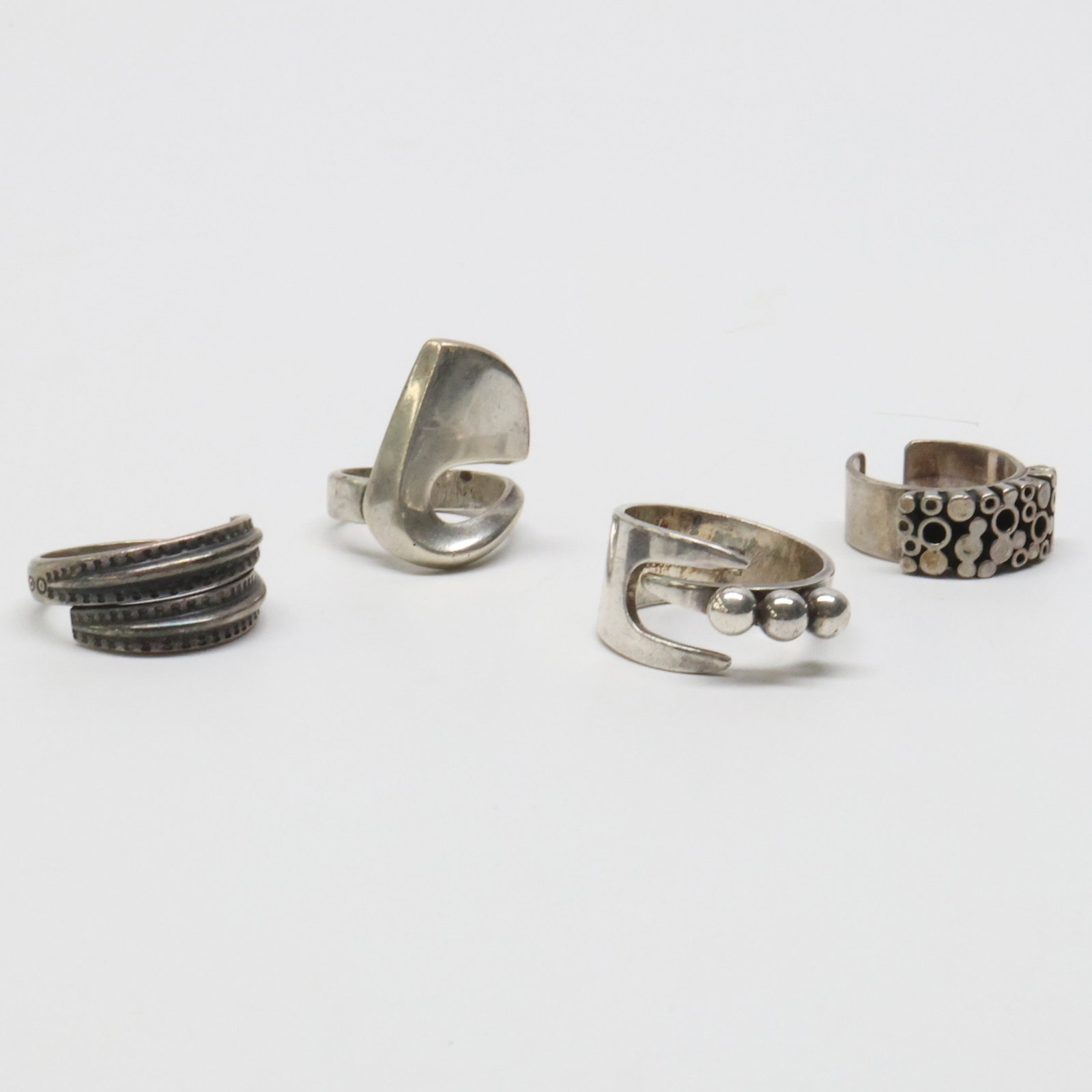 DAVID ANDERSEN; Four Modernist Sterling Silver Abstract Motif Rings (1 of 5)