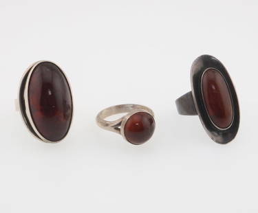 NIELS ERIK FROM; Three Modernist Sterling Silver And Amber Rings: Ring sizes 6 to 7, stones from 10mm to 13mm x 25mm. Total weight 18 grams. Minor wear to stones.