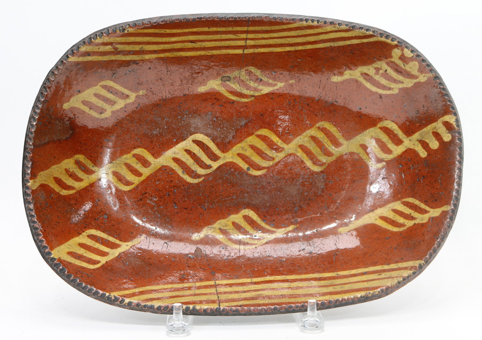 Pennsylvania slip-decorated redware loaf dish, 19th century (1 of 4)