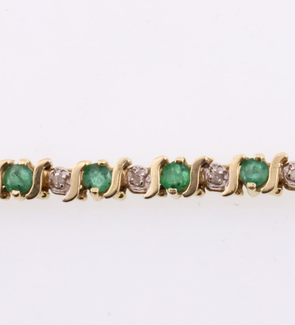 14k Gold 7.25" Natural Emerald & Diamond Bracelet 8.6g: Metal Type/Purity: 14k Gold Weight: 8.6g Dimensions: 7.25" X .25" Approx. Emeralds Heavily Included, Diamonds I2 I3 Clarity