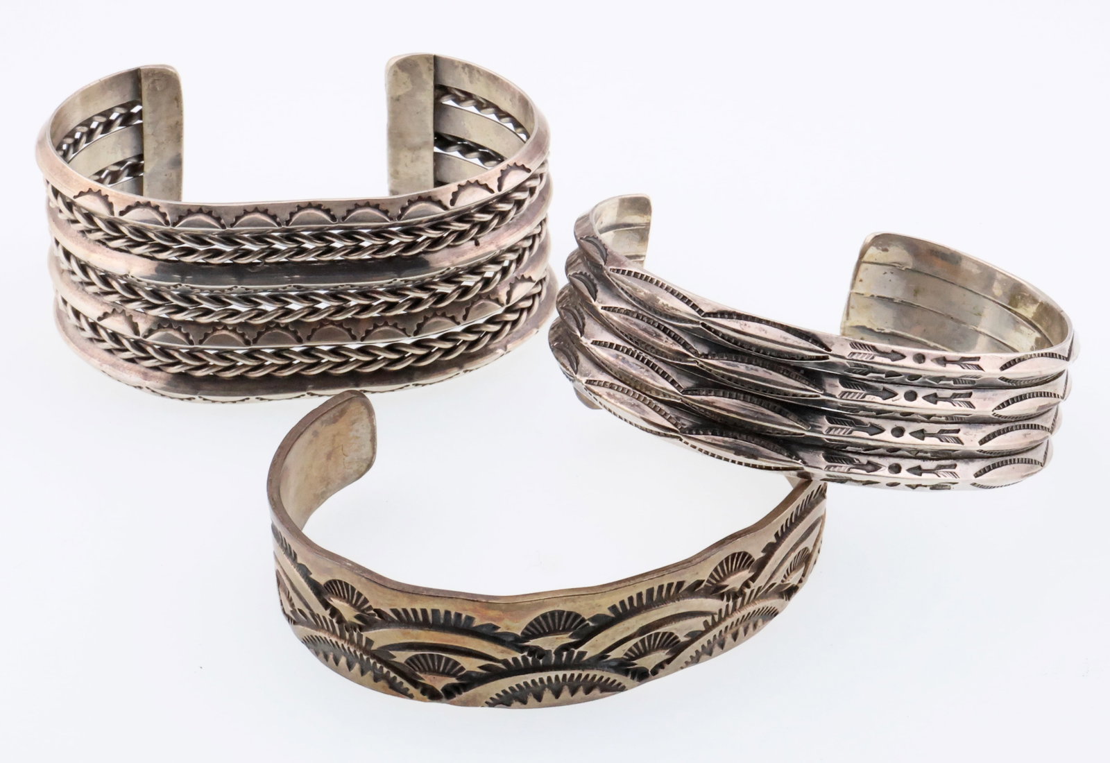 NATIVE AMERICAN; Three Silver Cuff Bracelets With Stampwork (1 of 5)