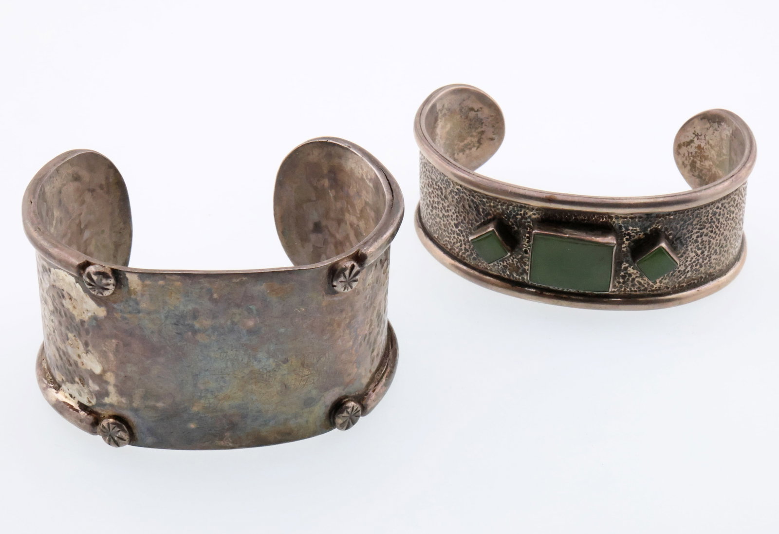 NATIVE AMERICAN; Two Unmarked Silver Cuff Bracelets: Interior widths 2.375 inches to 2.5 inches plus 1.25 to 1.375 inch gaps. Total weight 141 grams. Good condition.