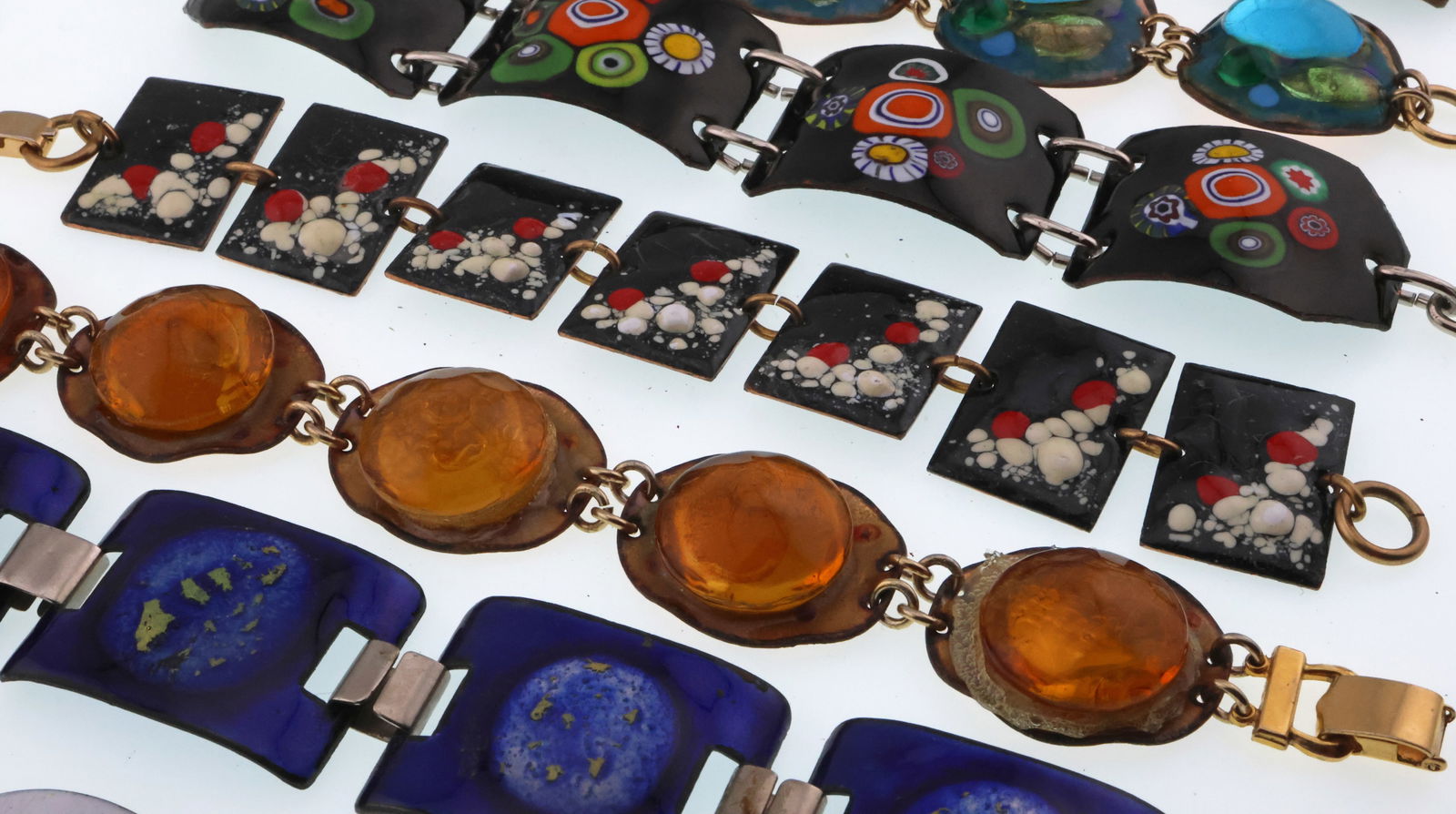 Modernist Fused Glass Enamel Jewelry; Nine Link Bracelets: Various Sizes. Good Condition with the Exception of One Bracelet Having a Detached Stone.