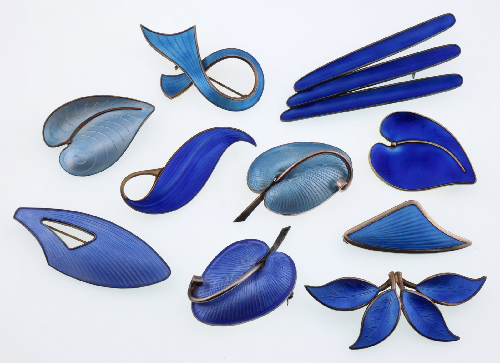 Scandinavian; Ten Modernist Sterling Silver Blue Enamel Brooches: Various Sizes, Total Weight 104 Grams. Good Condition with Some Minor Imperfections