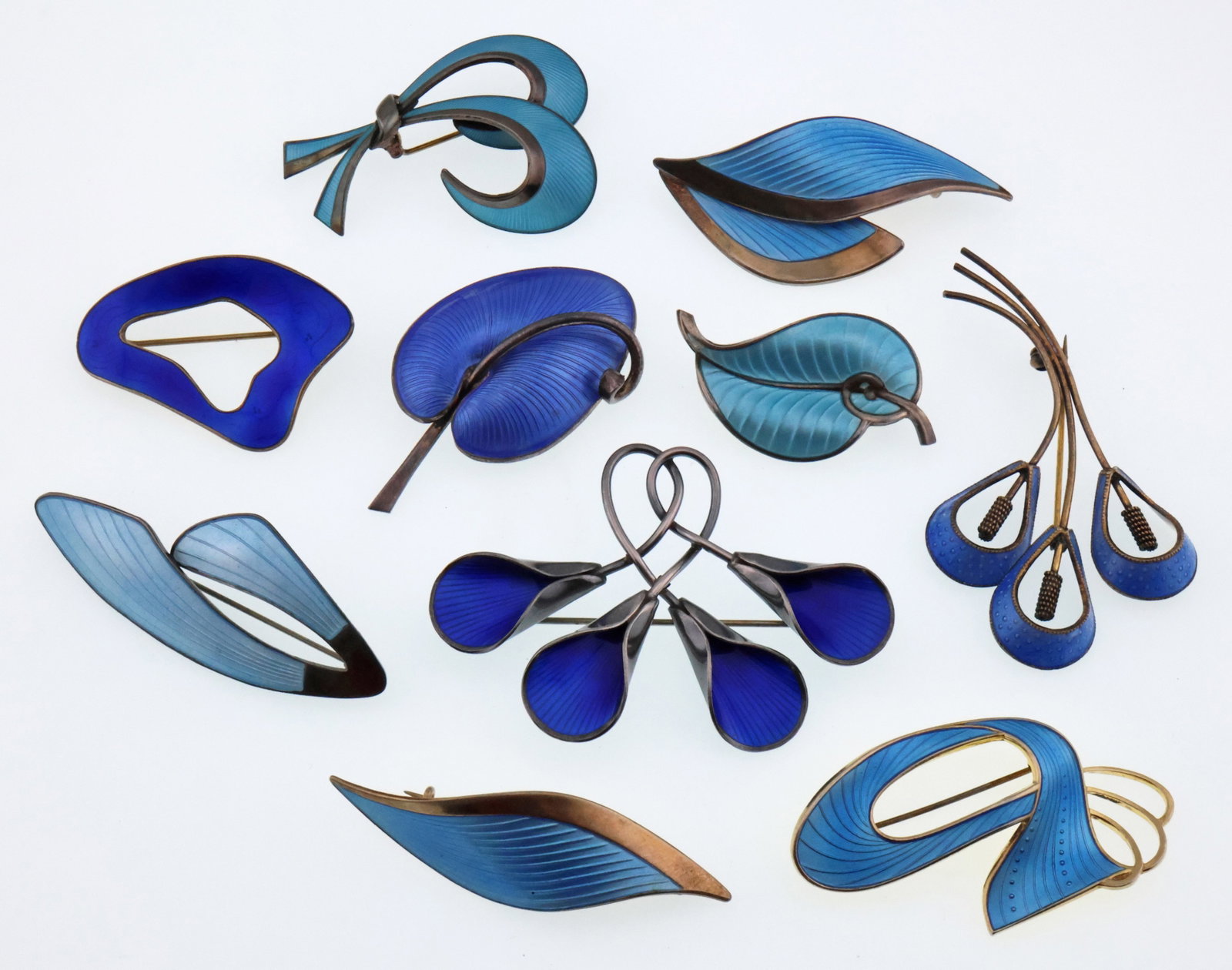 Scandinavian; Ten Modernist Sterling Silver Blue Enamel Brooches: Various Sizes, Total Weight 92 Grams. Good Condition with Some Minor Imperfections