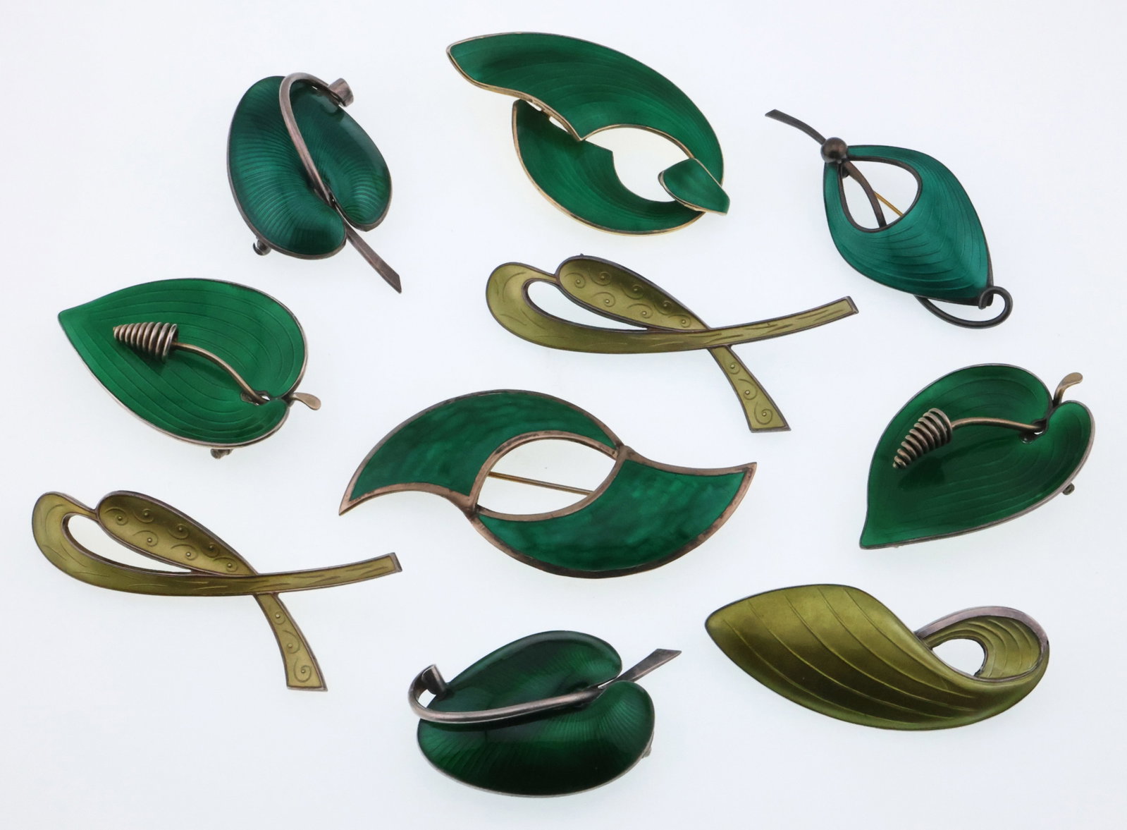 Scandinavian; Ten Modernist Sterling Silver Green Enamel Brooches: Various Sizes, Total Weight 117 Grams. Good Condition with Minor Imperfections.
