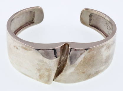 Bjorn Weckstrom, Finland; Modernist Sterling Silver Cuff Bracelet: Interior Width 2.25 Inches, Gap 0.875 Inch. Weight 36 Grams. Good Condition with Minor Imperfections.