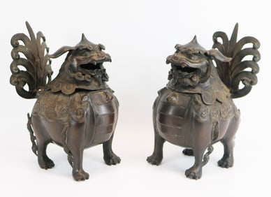 Pair Asian bronze incense burners in the form of foo dogs