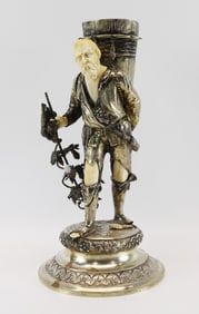 *German bone-mounted silver figure of a traveler